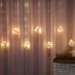 Χριστουγεννιάτικα Φωτάκια Κουρτίνα 10led Άγιος Βασίλης Διάφανες Μπάλες Θερμό Χρώμα 3M - Christmas curtain light - Image 2